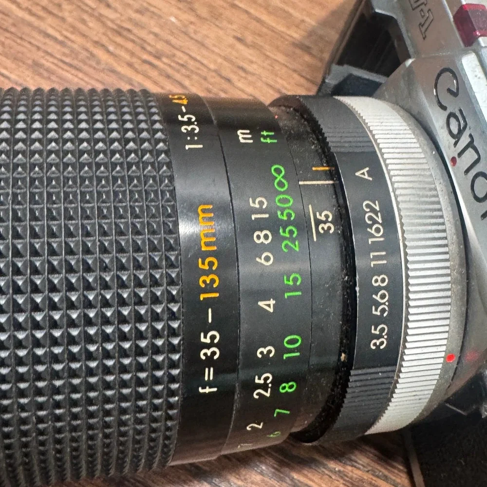 Canon AV 1 35mm SLR Film Camera Silver Sakar 35 135mm Lens Strap Untested